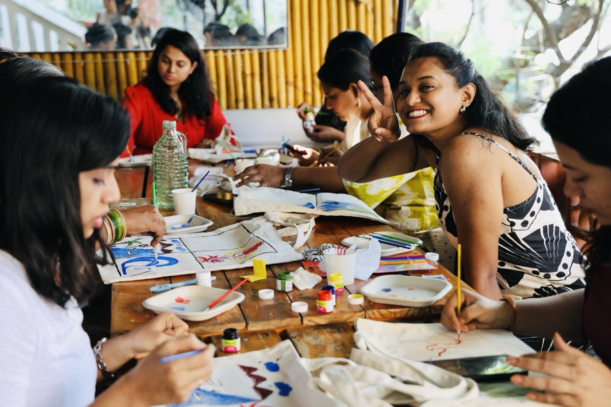 Women laughing at a craft workshop